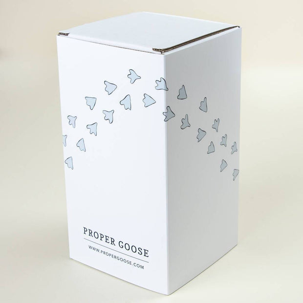 Glass jar packaging. White box with goose feet and Proper Goose branding.